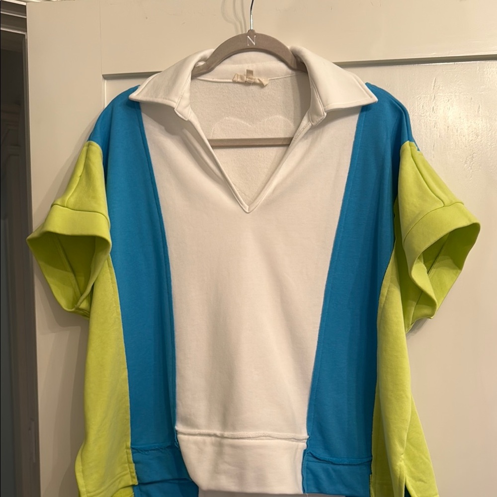 Entro Blue and White Polo with Green Accents